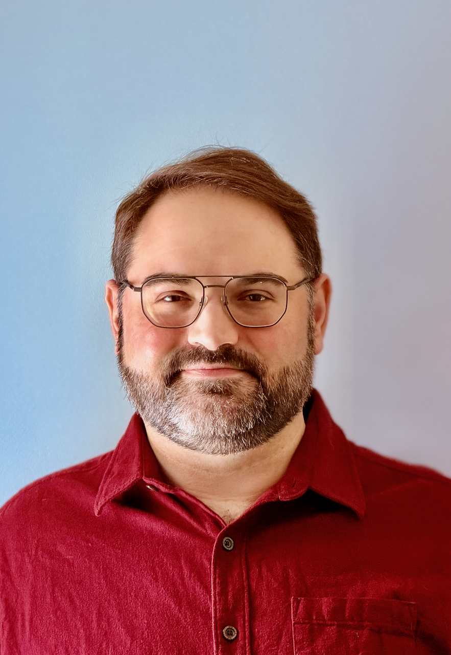 Headshot of Drew Paine, PhD from 2026